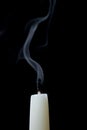 Smoldering candle Royalty Free Stock Photo