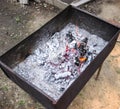 Smoldering coals in the grill. Burning fire after a shish kebab. Royalty Free Stock Photo