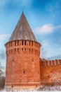 Smolensk Russia January 2015. The tower of the Kremlin from red brick and a wooden sharp roof against the blue sky Royalty Free Stock Photo