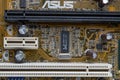 Smolensk, Russia - 07.26.2022: Old dusty ASUS computer motherboard after years of use