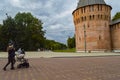 Smolensk, Russia â 09.17.2022: View of the Thunder Tower against the background of the square and the Ferris wheel