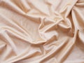 Smooth beige silk or satin texture for wedding background