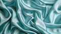 Smooth blue satin fabric texture. Luxurious silk material background for design and print Royalty Free Stock Photo