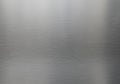 Smooth brushed metal surface exhibiting a subtle texture with fine Royalty Free Stock Photo