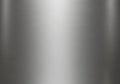 Smooth, brushed metal texture with a reflective silver surface. The Royalty Free Stock Photo