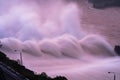 Smooth draining water from the hydroelectric dam at dawn