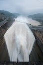 Smooth draining water from the hydroelectric dam at dawn