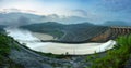 Smooth draining water from the hydroelectric dam at dawn