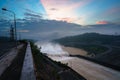 Smooth draining water from the hydroelectric dam at dawn