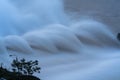 Smooth draining water from the hydroelectric dam at dawn