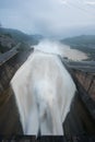 Smooth draining water from the hydroelectric dam at dawn Royalty Free Stock Photo