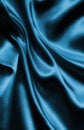 Smooth elegant blue silk or satin luxury cloth texture as abstract background. Luxurious Christmas background or New Year Royalty Free Stock Photo