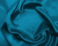 Smooth elegant blue silk or satin luxury cloth texture as abstract background. Luxurious Christmas background or New Year Royalty Free Stock Photo