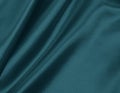 Smooth elegant blue silk or satin luxury cloth texture as abstract background. Luxurious Christmas background or New Year Royalty Free Stock Photo