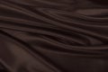 Smooth elegant brown silk or satin texture as abstract background. Luxurious background design. In Sepia toned. Retro style