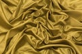 Smooth elegant gold silk or satin luxury cloth texture can use a Royalty Free Stock Photo