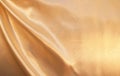 Smooth elegant golden silk as background
