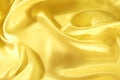 Smooth elegant golden silk or satin as wedding background Royalty Free Stock Photo