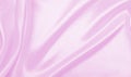 Smooth elegant pink silk or satin texture as wedding background. Royalty Free Stock Photo