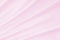 Smooth elegant pink silk or satin texture as wedding background. Royalty Free Stock Photo