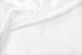 Smooth elegant white silk or satin luxury cloth texture as wedding background. Luxurious Christmas background or New Year