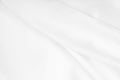 Smooth elegant white silk or satin luxury cloth texture as wedding background. Luxurious Christmas background or New Year