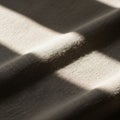 Smooth fabric indicating sunlight filtering through a window or another Royalty Free Stock Photo