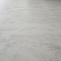 Smooth, flat concrete surface with a uniform gray color. The texture is consistent, Royalty Free Stock Photo