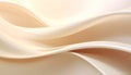 Smooth flowing abstract waves of creamy beige and soft white fabric creating a and background texture Royalty Free Stock Photo