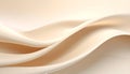 Soft flowing beige fabric waves with subtle lighting creating a smooth abstract background texture Royalty Free Stock Photo