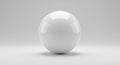 A smooth, glossy white sphere centered in a minimalist setting. It reflects light and its Royalty Free Stock Photo