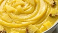 Flat Lay of Yellow Pineapple Sauce with Swirling Texture and Glossy Surface Across the Entire Frame Royalty Free Stock Photo