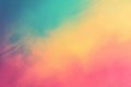 A smooth gradient background with a blend of turquoise, yellow, and pink, with a subtle texture and specks. Royalty Free Stock Photo
