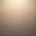 A smooth gradient background displaying a subtle transition of warm beige tones Royalty Free Stock Photo