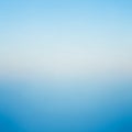 A smooth gradient background transitions from a light blue at the top to a darker blue at the Royalty Free Stock Photo