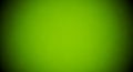 Smooth Gradient Background with a Vibrant Lime Green Hue and Dark Vignette texture Royalty Free Stock Photo