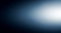 Dark blue to bright white gradient background with soft light diffusion and subtle dark vignette effect Royalty Free Stock Photo