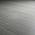Smooth gray concrete surface with subtle horizontal streaks. The texture is uniform, Royalty Free Stock Photo