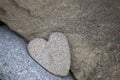 Single Heart Shaped Pebble On Rock Royalty Free Stock Photo