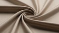 Smooth light beige fabric intricately twisted into a spiral pattern Royalty Free Stock Photo