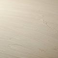 A smooth, light beige surface with a subtle texture and faint lines or ridges, possibly Royalty Free Stock Photo