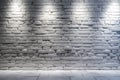 A smooth, light gray brick wall with even surfaces, illuminated by soft, ambient lighting for a Royalty Free Stock Photo