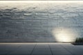 A smooth, light gray brick wall with even surfaces, illuminated by soft, ambient lighting for a Royalty Free Stock Photo