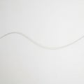 A smooth, light gray wavy line on a plain white background. The line gently curves, Royalty Free Stock Photo