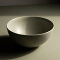 A smooth, matte-finished ceramic bowl with Royalty Free Stock Photo