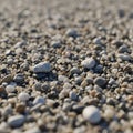 Smooth, multicolored pebbles cover a surface, creating a natural, textured landscape. Royalty Free Stock Photo