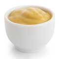 Smooth mustard in white ceramic ramekin.