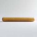 Natural bamboo cylinder with rounded ends on a white surface, close-up studio shot Royalty Free Stock Photo