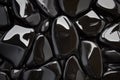 Smooth obsidian stone texture, jet black with sharp reflections and glossy highlights, bold and Royalty Free Stock Photo