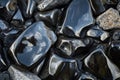 Smooth obsidian stone texture, jet black with sharp reflections and glossy highlights, bold and Royalty Free Stock Photo